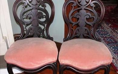 Pair of rosewood laminated side chairs, attrib. to Meeks