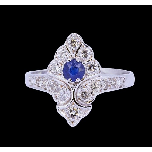 SAPPHIRE AND DIAMOND DRESS RING, set with a blue sapphire of...