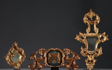Set of three carved and gilded baroque wood panels, two mirrors and a cartouche with coat of arms an