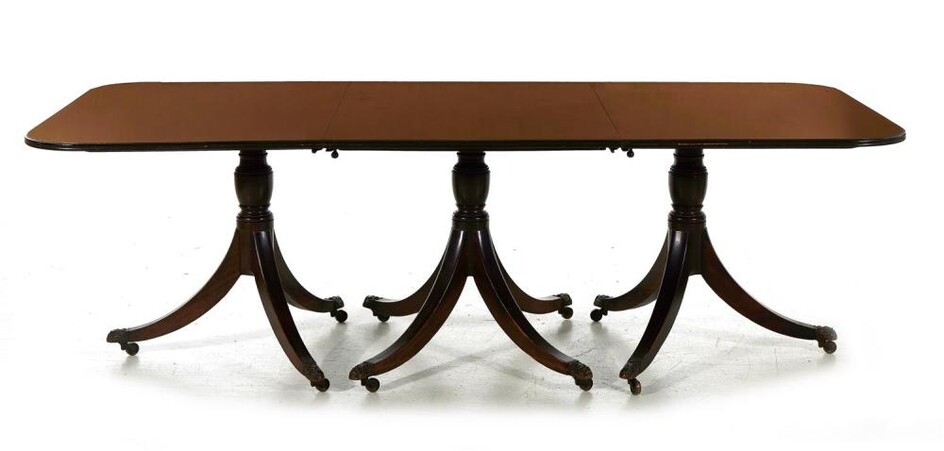 Sheraton style inlaid mahogany three-pedestal dining table