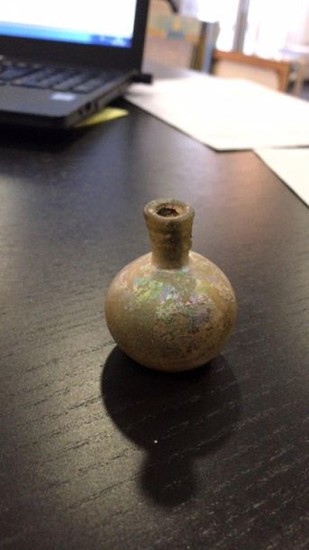 Small iridescent glass vase, neck decorated with a...