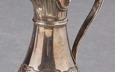 Small silver ewer or cruette, belly decorated with...