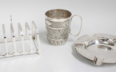 Three Silver Items, comprising an ashtray, 13.5cm diameter; a six-bar...