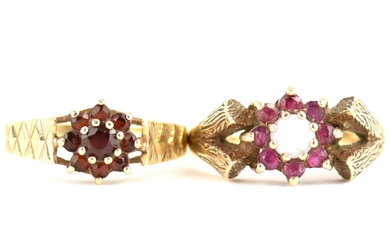 Two 1970s 9ct gold ruby cluster rings, one with central...