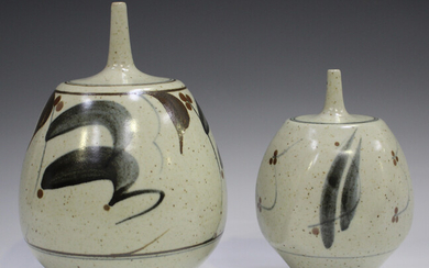 Two Derek Clarkson studio pottery vases, each with a narrow neck above a bulbous body, the oatmeal g