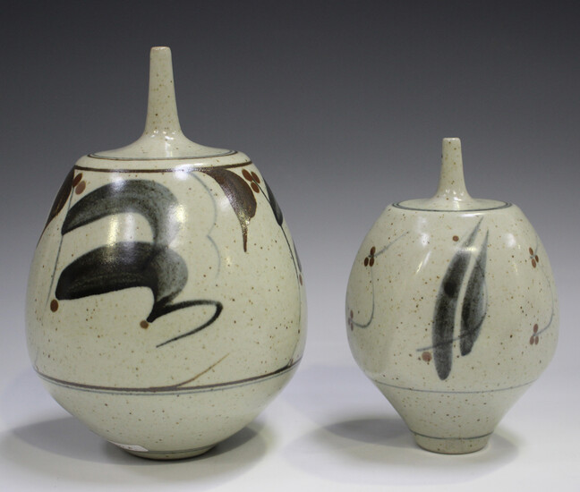 Two Derek Clarkson studio pottery vases, each with a narrow neck above a bulbous body, the oatmeal g
