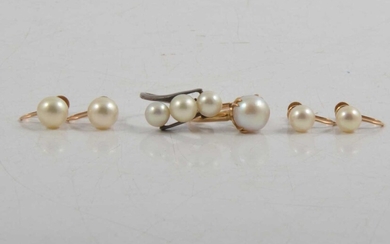 Two cultured pearl dress rings and two pairs of cultured pearl earscrews.