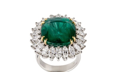 White gold ring with emerald and diamonds.