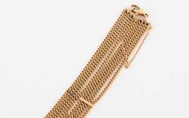 Yellow gold bracelet (750) made of 4 rows of flat curb chain.