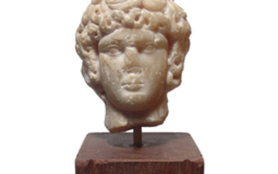 A handsome Roman alabaster head of a youth