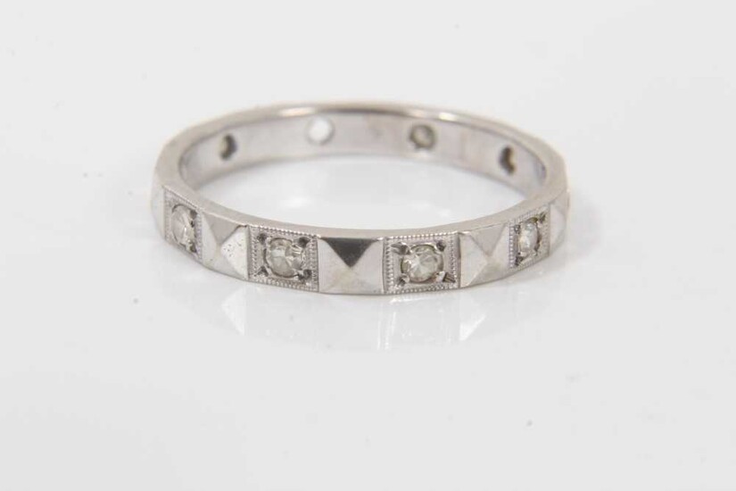 18ct white gold diamond eternity ring (one stone missing)