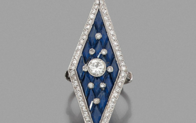 CIRCA 1920 SAPPHIRE RING A sapphire, diamond and gold ring....