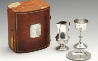 An early twentieth century silver travelling communion set.