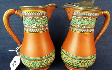 Two lovely enamel decorated terracotta wine jugs, one with pewter lid, by Atkin Bros, Sheffield. Excellent