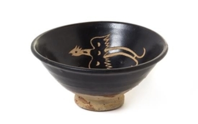 * A White Slip Decorated Black Glazed Stoneware Bowl