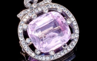 A gold-mounted pink topaz and diamond brooch