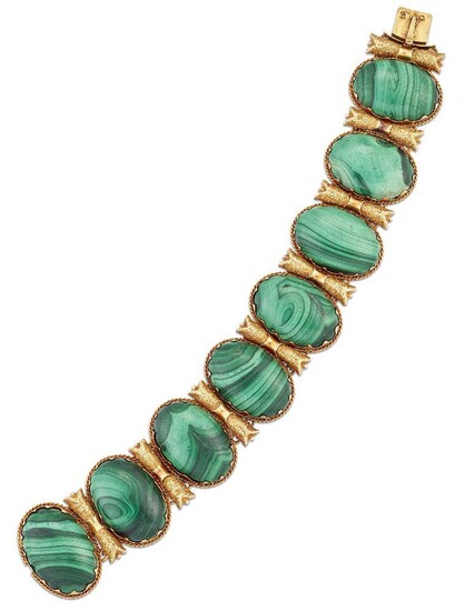 A 19th century Russian gold and malachite bracelet, composed of a series of oval cabochon malachite panels with gold textured bow shaped connecting links, c. 1870, Russian mark for St Petersburg and 56 standard mark, length 17cm