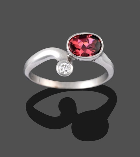 A 9 Carat White Gold Garnet and Diamond Ring, the...