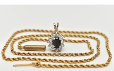 A 9CT GOLD CLUSTER PENDANT AND A YELLOW METAL CHAIN, oval cl...