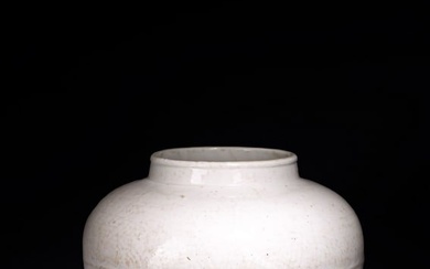 A CHINESE WHITE GLAZED INCISED JAR