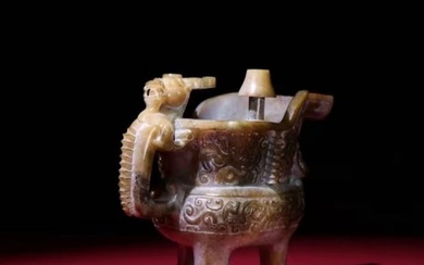 A Chinese Carved Jade Tripod Wine Pot