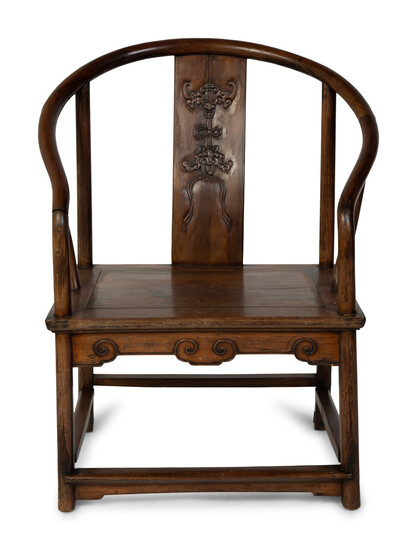 A Chinese Elmwood Horseshoe Back Armchair