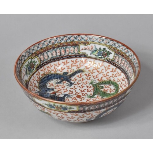 A Chinese Porcelain Bowl in the Famille Verte Palette Decora...