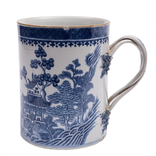 A Chinese blue and white mug: of cylindrical form with plait...