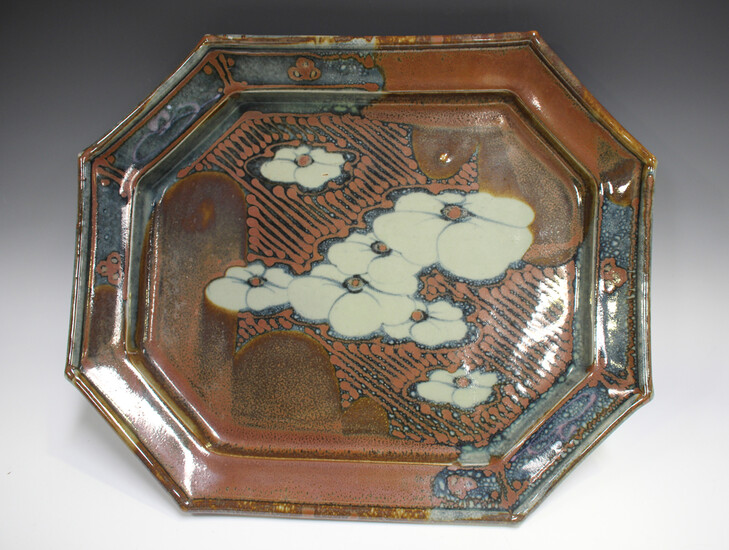 A David Frith studio pottery octagonal footed dish, the mottled blue and red/brown ground decorated