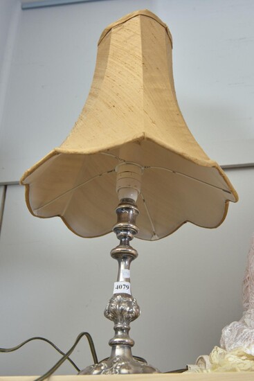 A EUROPEAN SILVER CANDLESTICK CONVERTED TO LAMP