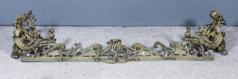 A French Gilt Brass Adjustable Fender, 19th Century, of...