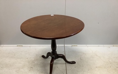 A George III mahogany tilt top tripod tea table, diameter 74...