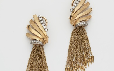 A German pair of 18k gold and diamond tassel clip earrings.
