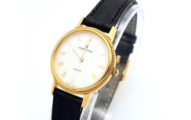 A Gold Plated Universal Quartz Ladies Watch. Black leather s...