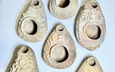 A LOT OF 7 SMALL BYZANTINE TERRACOTTA OIL LAMPS.