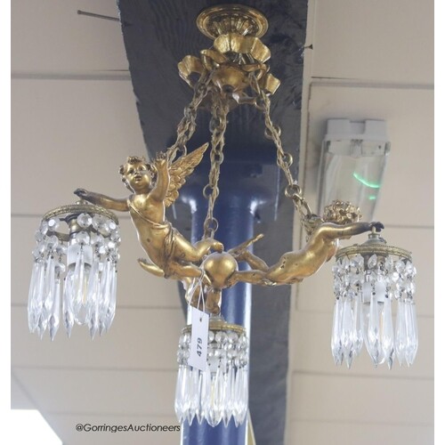 A Louis XV style gilt metal three light ceiling chandelier, ...