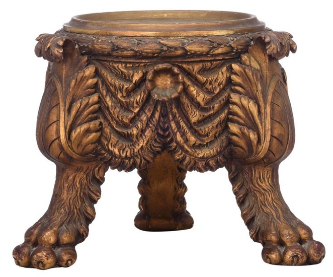 A Neoclassical gilt wooden carved lion paw tripod...