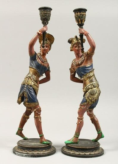 A PAIR OF 19TH CENTURY PAINTED SPELTER CANDLESTICKS