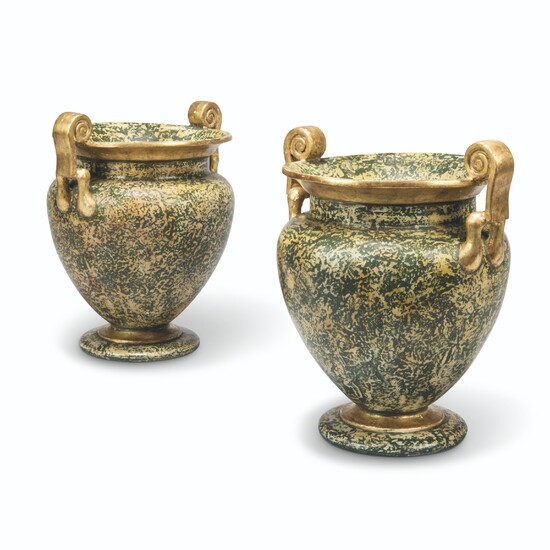 A PAIR OF TERRACOTTA SIMULATED MARBLE AND PARCEL-GILT URNS
