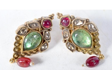 A Pair of Antique Gold Earrings set with Mughal Cut Diamonds...
