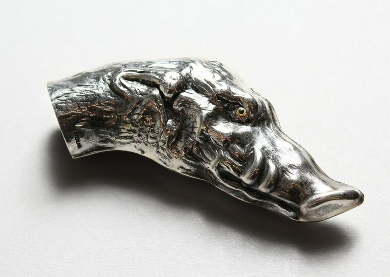 A SILVER-PLATED BOARS HEAD CANE HANDLE. 3ins long.