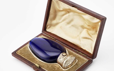 A VICTORIAN GOLD-MOUNTED BLUE-GLASS SCENT BOTTLE