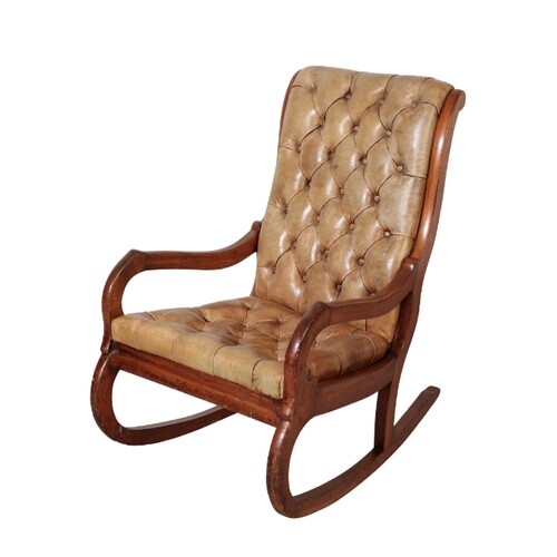 A VICTORIAN MAHOGANY ROCKING CHAIR 19th century, covered in ...