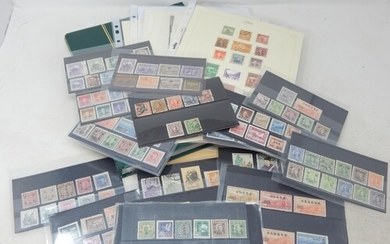 A Vast Collection of Chinese Stamps Contained in an Album & ...
