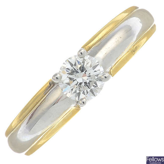 A bi-colour 18ct gold brilliant-cut diamond single-stone ring.