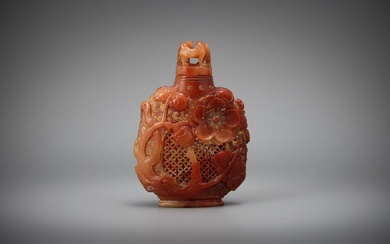 A carved Chinese soapstone snuff bottle