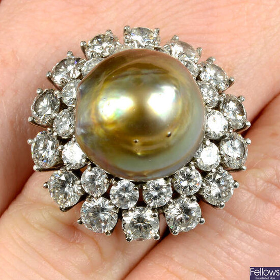A cultured pearl and graduated brilliant-cut diamond cluster ring.