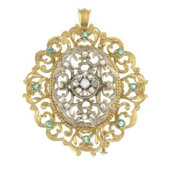 A diamond and emerald pendant. May also be worn as a