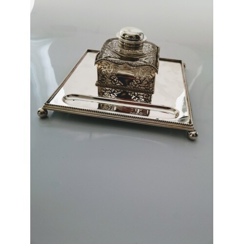 A fine Gentleman's Sterling Silver and cut glass desk ink st...