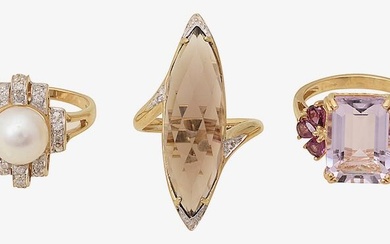 A group of gem-set dress rings